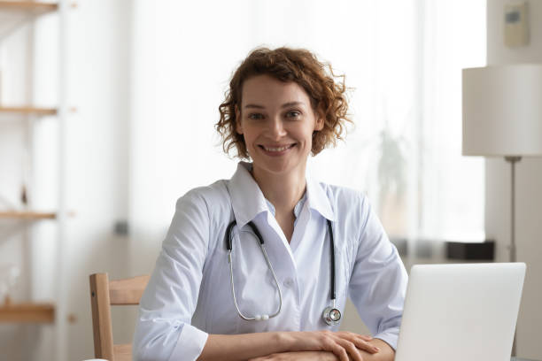 istock Portrait of smiling attractive trusted young female general practitioner. 1314334563