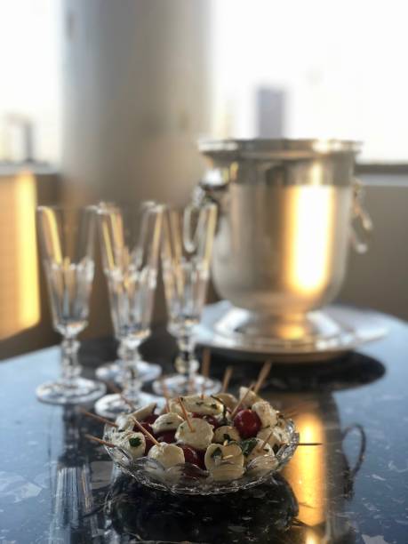 istock Appetizer with Champagne, cherry tomatoes and buffalo mozzarella 1314336160