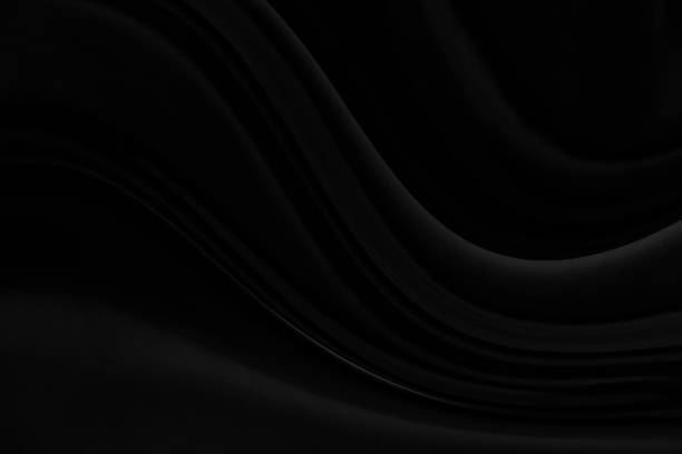 istock Black gray satin dark fabric texture luxurious shiny that is abstract silk cloth background with patterns soft waves blur beautiful. 1314339182