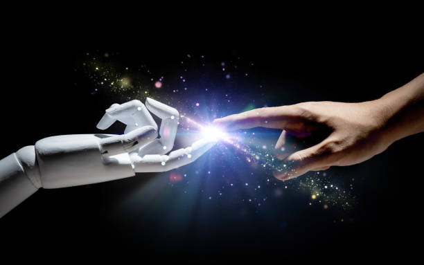istock Human finger connect to robot finger 1314340618