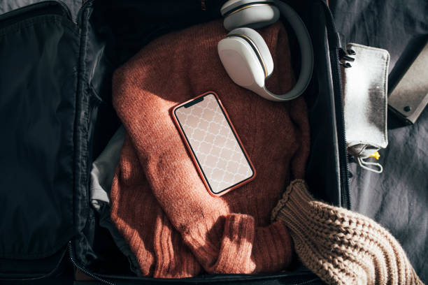 istock Still life:  Packing up Suitcase for Winter Holiday, an Overhead View (Flat Lay) 1314341940