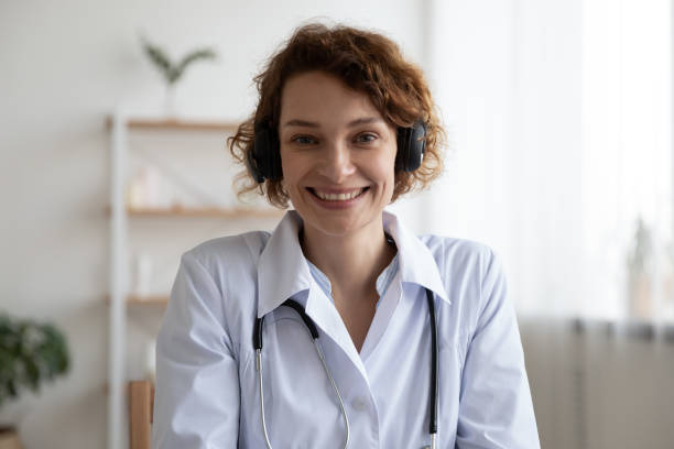 istock Smiling young skilled female general practitioner consulting patient online. 1314346731