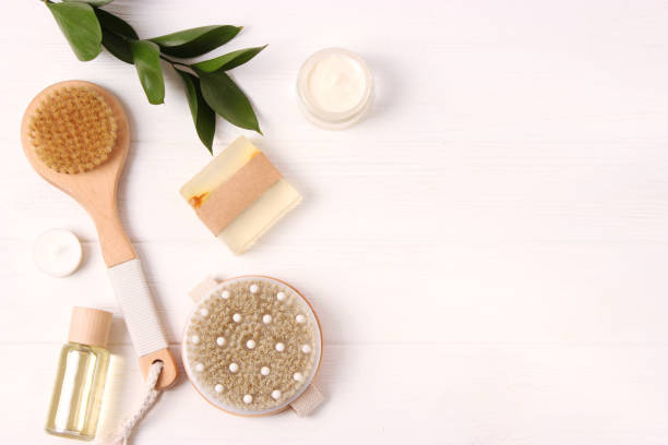 istock brush for dry massage on a colored background top view. 1314346809