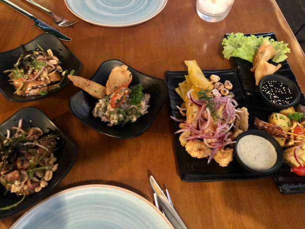 istock Mix of peruvian dishes, ceviche, fried prawns, octopus and anticucho 1314347452