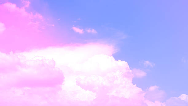 istock beauty sweet pastel soft pink with fluffy clouds on sky. multi color rainbow image. abstract fantasy growing light 1314348471
