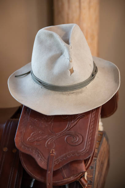istock Old western resting on horse saddle 1314348777