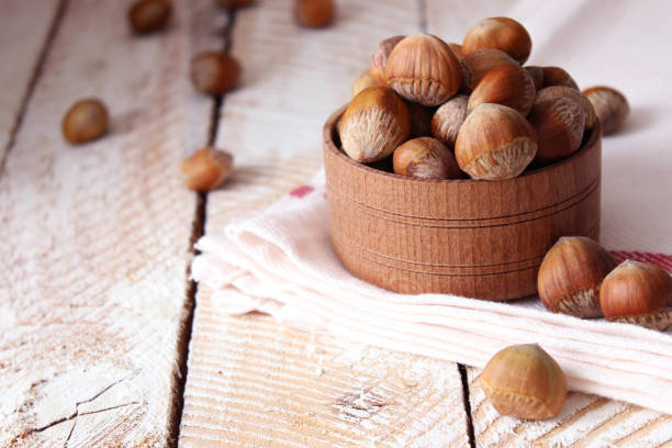 istock Peeled hazelnuts on the table close up 1314356620
