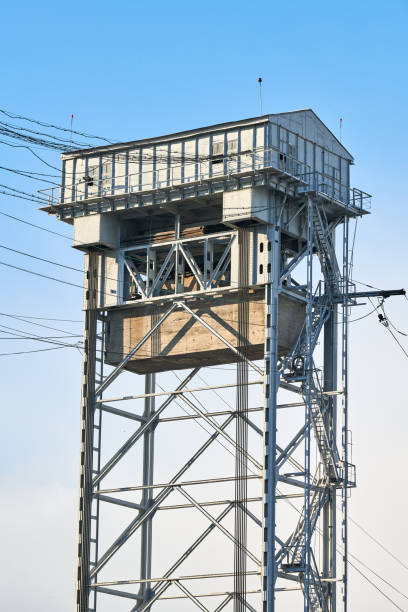 istock Two-tier vertical lift bridge with railways car road 1314357924