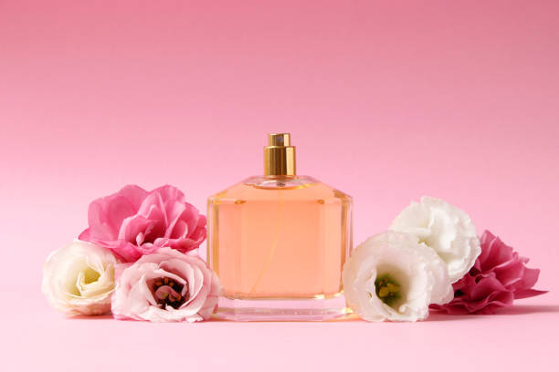 istock perfume and flowers on a colored background. 1314357938