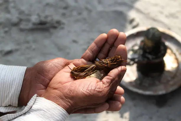 Photo of Hindu religious offering, Lord shiva Puja bank of Ganga Sagar