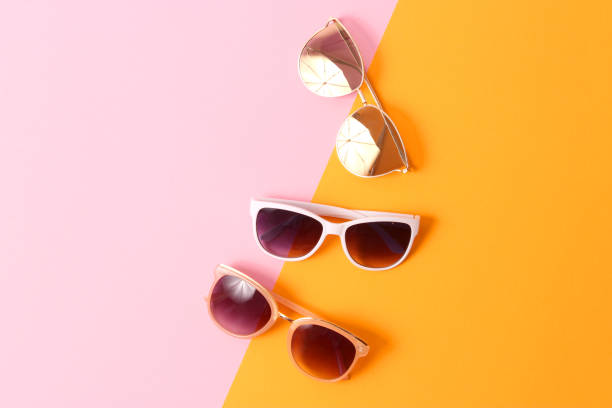 istock set of sunglasses on a colored background top view. 1314359999