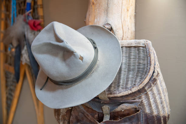 istock Old western resting on fly fishing bag 1314360879