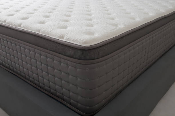 closeup of bed and luxury mattress closeup of bed and luxury mattress, thick and soft material mattress stock pictures, royalty-free photos & images