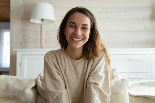istock Screen view of smiling woman speak on video webcam call 1314362441
