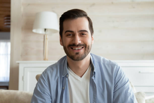 istock Portrait of smiling man talk on video call 1314362447
