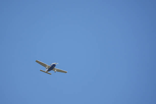 istock close up of a white flying propeller plane 1314362508