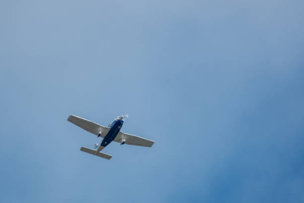 istock close up of a white flying propeller plane 1314362509
