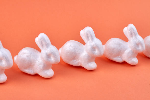 istock White miniature decorative rabbits. Symbol of Easter. 1314362788