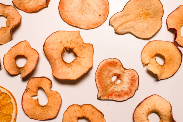 istock Dried fruit isolated on white background. Dried grapefruit, dried apple, dried pear. 1314364790