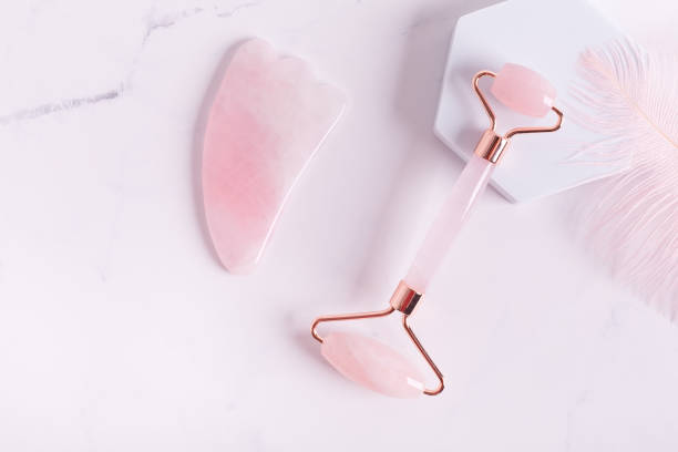 istock Trendy accessory facial massage gua sha roller 1314368913
