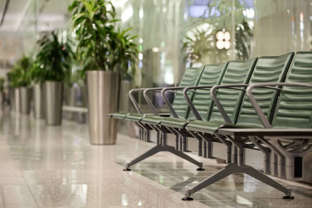 istock Empty seats in airport terminal interior. Departure area 1314371337
