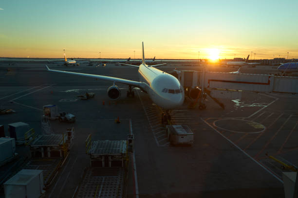 istock A docked plane at the airport at sunset 1314371409