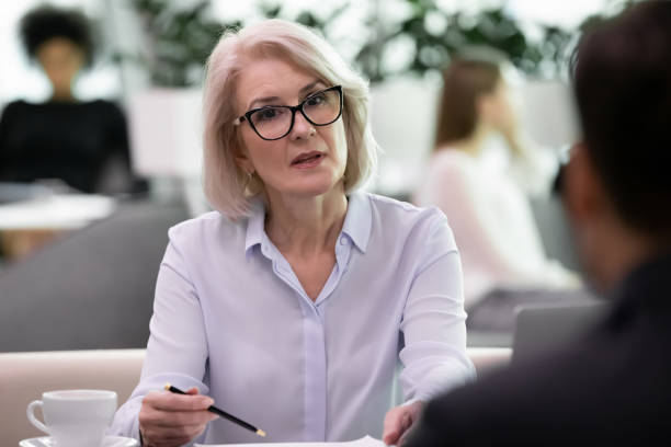 istock Confident middle-aged businesswoman have interview with applicant 1314375766