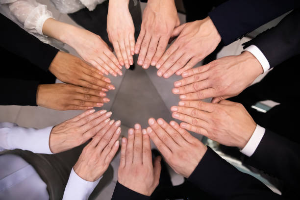 istock Close up of diverse employees engaged in teambuilding activity 1314375816