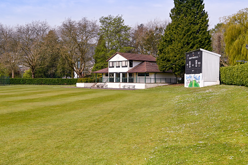 Pontypridd, wales - April 2021: Pavilion and scoreboard at the cricket ground in Ynysangharad Park in Pontypridd.