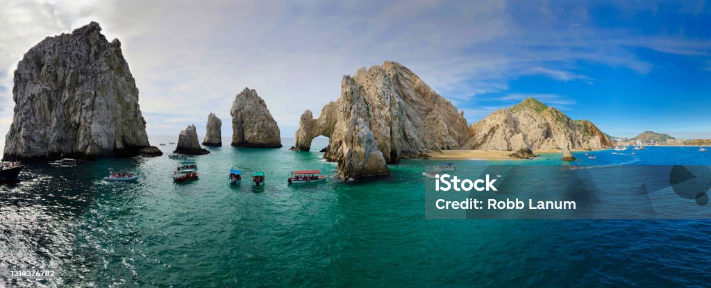 The Panorama Arch Panoramic shot of El Arco and the rocky coastline of Cabo San Lucas, Mexico Mexico Stock Photo