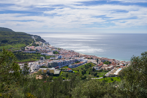 Portugal touristic town Sesimbra seen from the castle above. Aerial view, sea