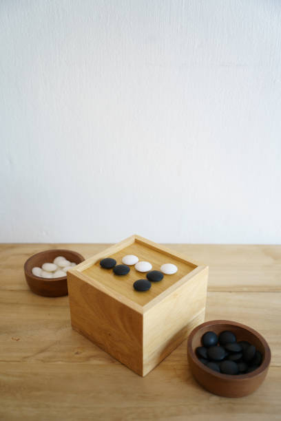 istock baduk board game - small toy souvenir board game with copy space 1314377166