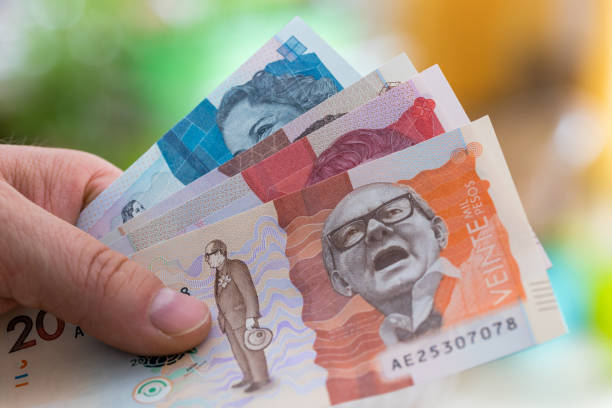 Colombian money, bills of different amounts Colombian money, bills of different amounts colombian peso stock pictures, royalty-free photos & images