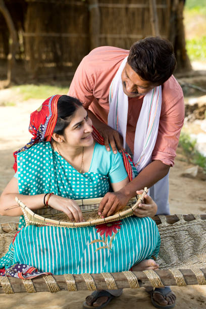 istock Rural couple cleaning wheat grain 1314381604