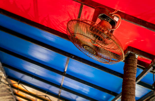 istock Tropical ceiling fan, installed over head, a colorful awning 1314381786