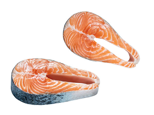 istock Steaks of a salmon on a white background 1314384326