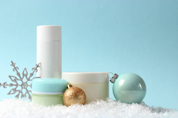 istock Winter care cosmetics on a colored background top view. 1314385601
