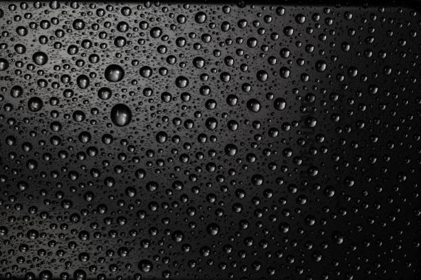 téléphone intelligent gris - bouncing water drop liquid photos et images de collection