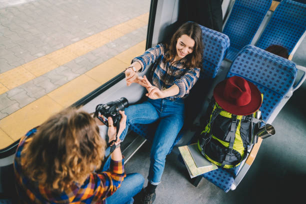 istock Couple traveling in train and vlogging 1314388938