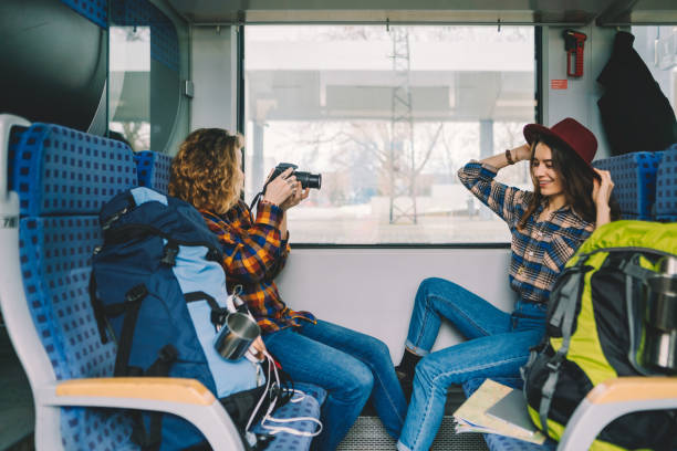 istock Couple traveling in train and vlogging 1314388950