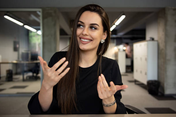 istock Happy young businesswoman talking video calling on skype looking at web cam 1314393220