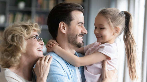 istock Affectionate three generations family enjoying sweet moment at home. 1314393231