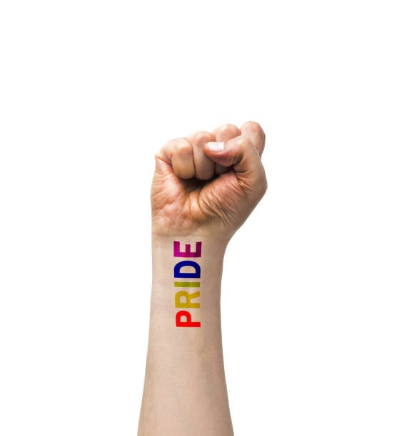 istock Gay guy's hand with a tattoo that says pride 1314395855