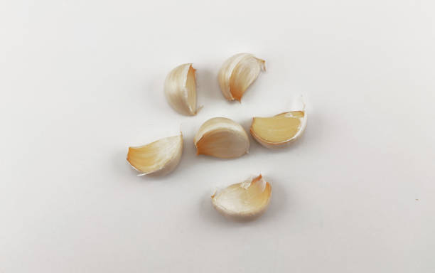 studio shot of garlic cloves