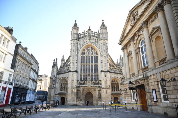 Bath Abbey with clear skys Photo of Bath Abbey, UK during a clear morning bath abbey stock pictures, royalty-free photos & images