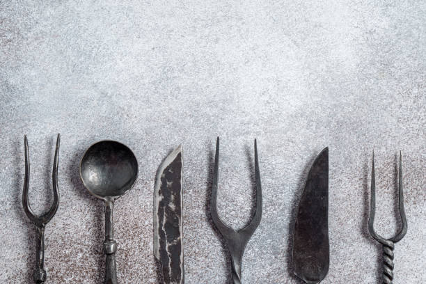 istock Vintage fork spoon and knife on concrete 1314405383