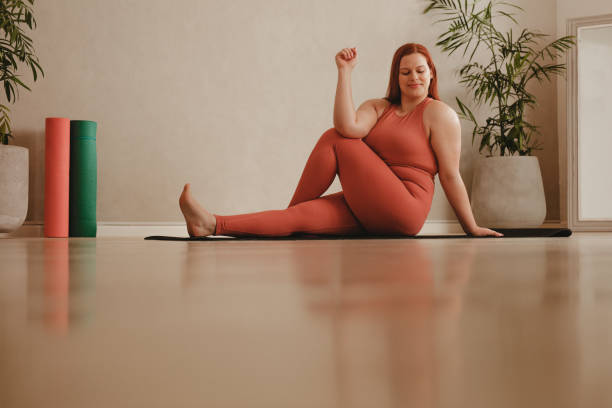 istock Fit woman doing yoga at home 1314407779