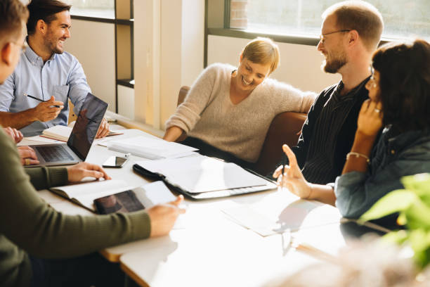 istock Creative team sharing a funny moment in meeting 1314408417
