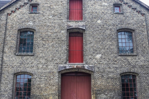 istock Old weathered and aged brick wall building. 1314411023
