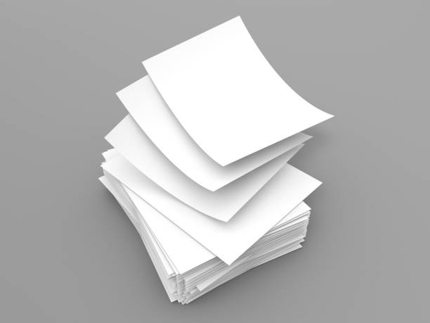 istock Stack of white sheets of A4 office paper on a gray background. 1314414028